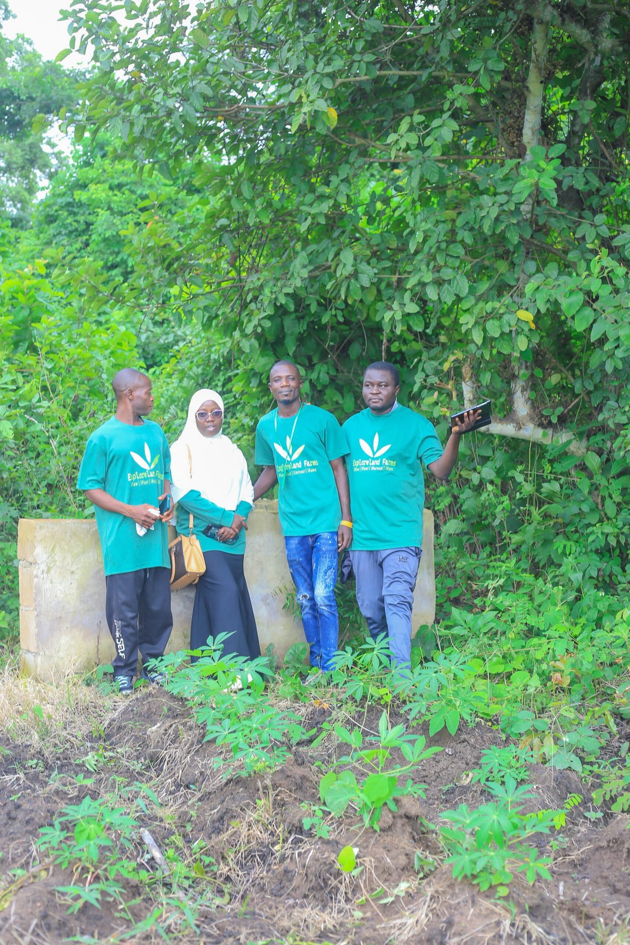 ExploreLand Farms team on a site visit